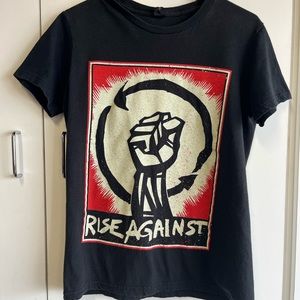 Rise Against Band T-shirt. Extra small. Black, preowned, good condition.